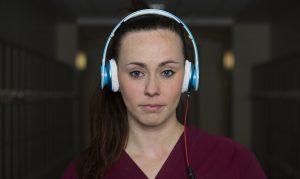 female student audio review