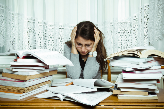 A young woman going through anxiety and study stress
