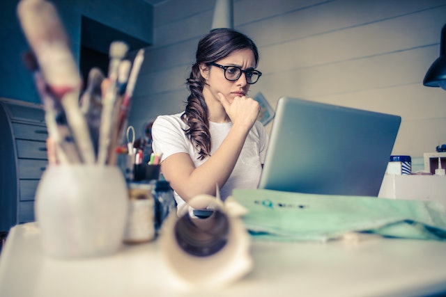 a young young health worker working online at home