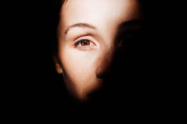 a woman showing only her left eye