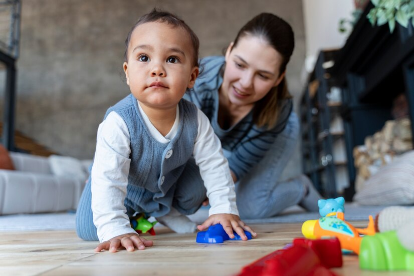 An infant with his caregiver - featured image